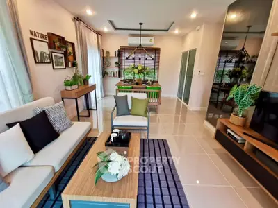 Stylish modern living room with elegant decor and open layout, perfect for comfortable living.