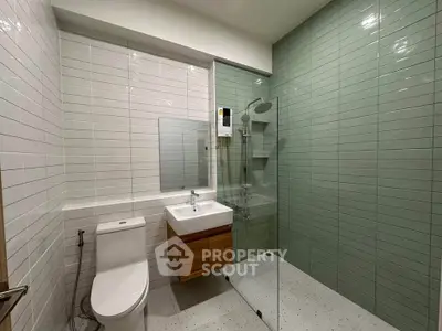 Modern bathroom with sleek design and glass shower enclosure