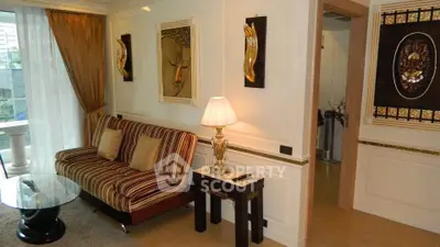 Luxurious living room with elegant decor and large window view