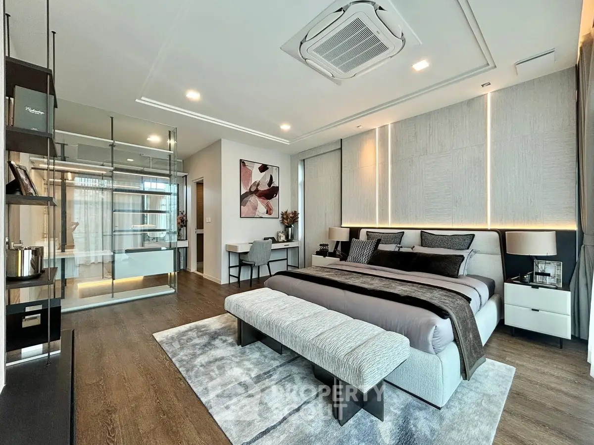 Luxurious modern bedroom with elegant decor and spacious layout