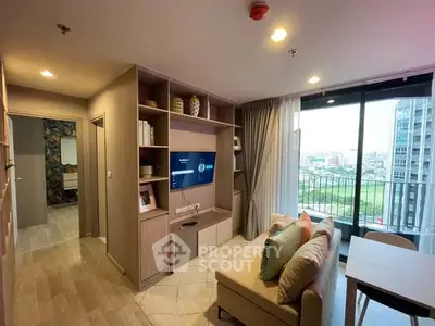 Modern living room with balcony view and stylish decor in urban apartment