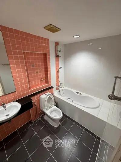 Modern bathroom with bathtub and stylish tile design
