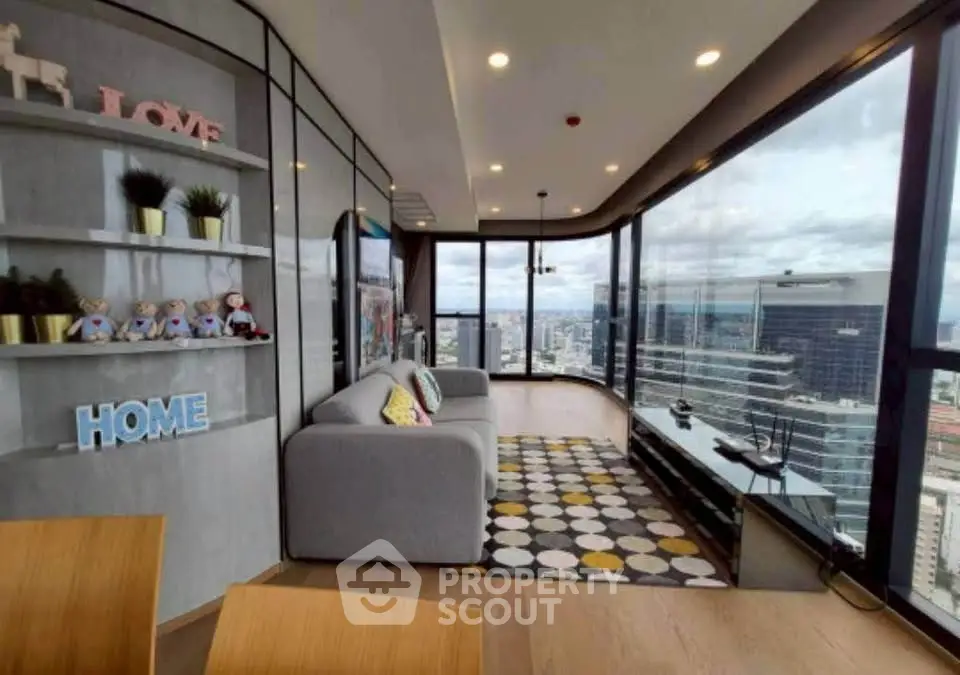 Stunning corner unit living room with panoramic city views and modern decor