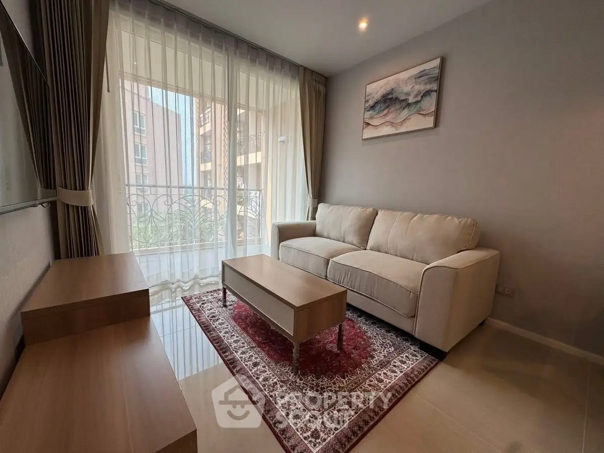 Elegant living room with cozy sofa and stylish decor in modern apartment