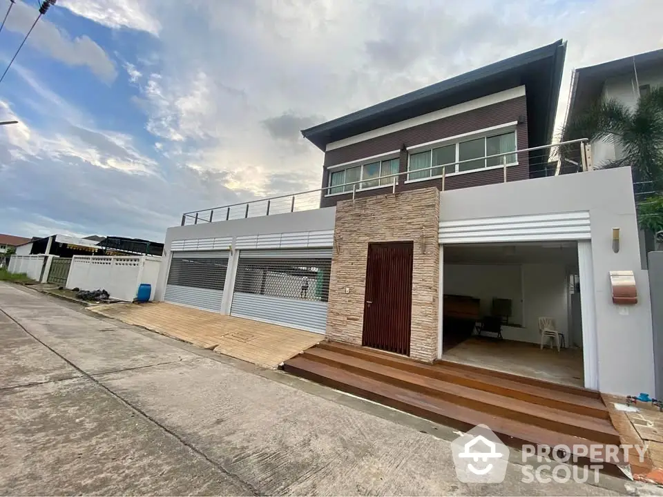 Modern two-story house with spacious garage and contemporary design