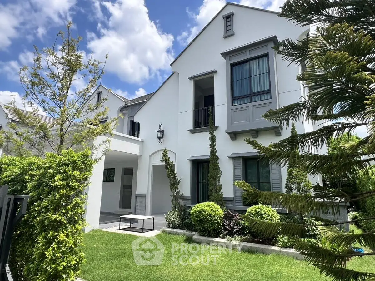 Charming modern house with lush garden and elegant facade