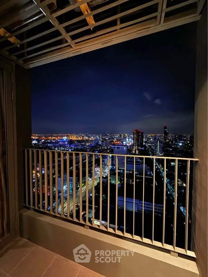 Stunning night cityscape view from a high-rise balcony, perfect for urban living enthusiasts.
