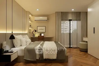 Modern bedroom with stylish decor and large window offering natural light.
