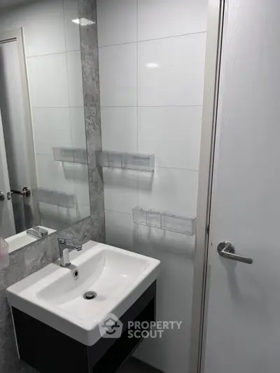 Modern bathroom with sleek sink and minimalist design