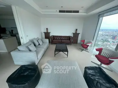 Spacious modern living room with panoramic city view and stylish furniture