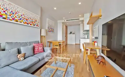 Modern living room with cozy decor and open kitchen layout