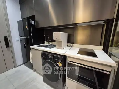 Modern kitchen with sleek appliances and minimalist design
