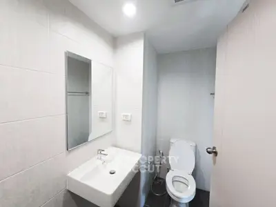 Modern bathroom with sleek fixtures and minimalist design