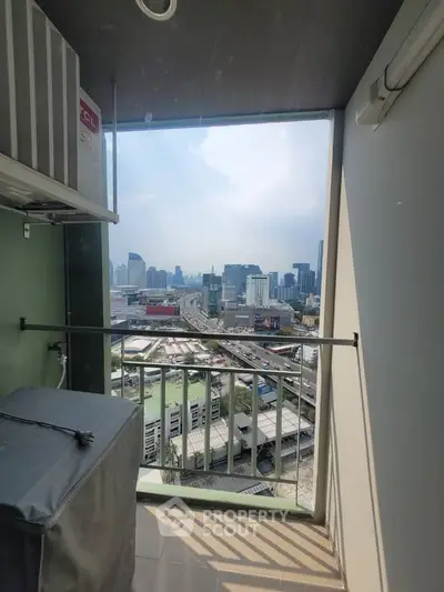 High-rise balcony with stunning cityscape view, perfect for urban living enthusiasts.