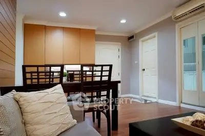 Modern living room with stylish furniture and warm lighting