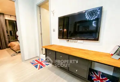Modern living room with wall-mounted TV and stylish decor