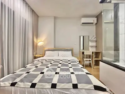 Modern bedroom with stylish decor and cozy ambiance