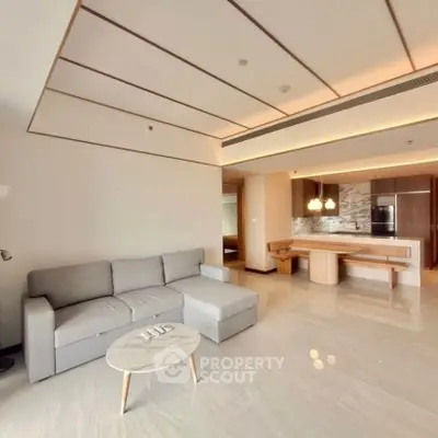 Spacious modern living room with open kitchen and elegant decor