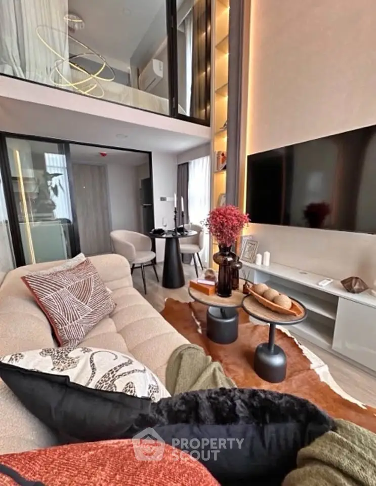 Luxurious modern living room with high ceilings and elegant decor