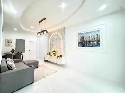Modern living room with elegant decor and stylish lighting in a contemporary home.