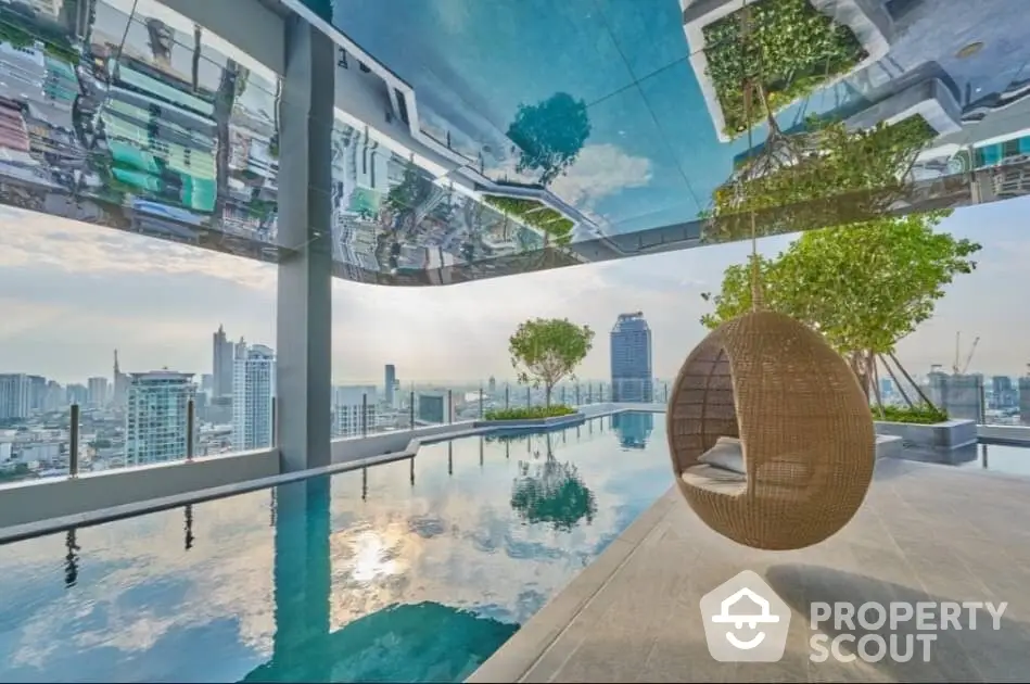 Luxurious rooftop infinity pool with panoramic city skyline view, modern wicker lounge chair, and tranquil waters reflecting the sky, perfect for high-end urban living.