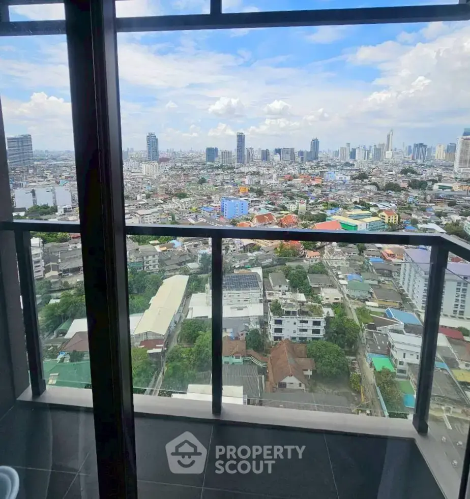 Stunning cityscape view from high-rise balcony with expansive skyline and urban landscape.