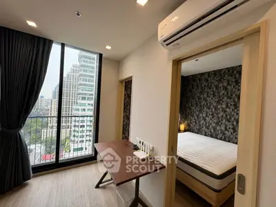 Modern apartment with balcony view, stylish bedroom, and workspace