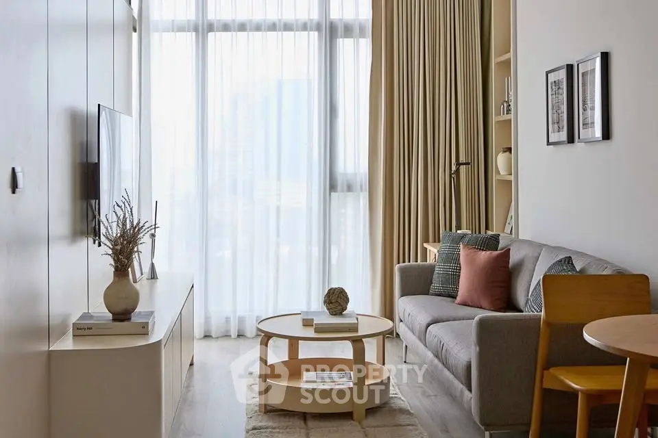 Modern living room with cozy sofa and stylish decor