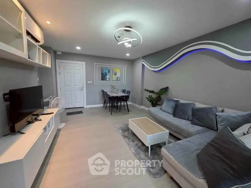 Modern living room with stylish decor and cozy seating area