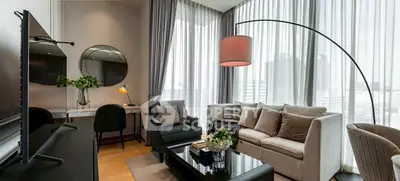 Luxurious modern living room with elegant decor and large windows
