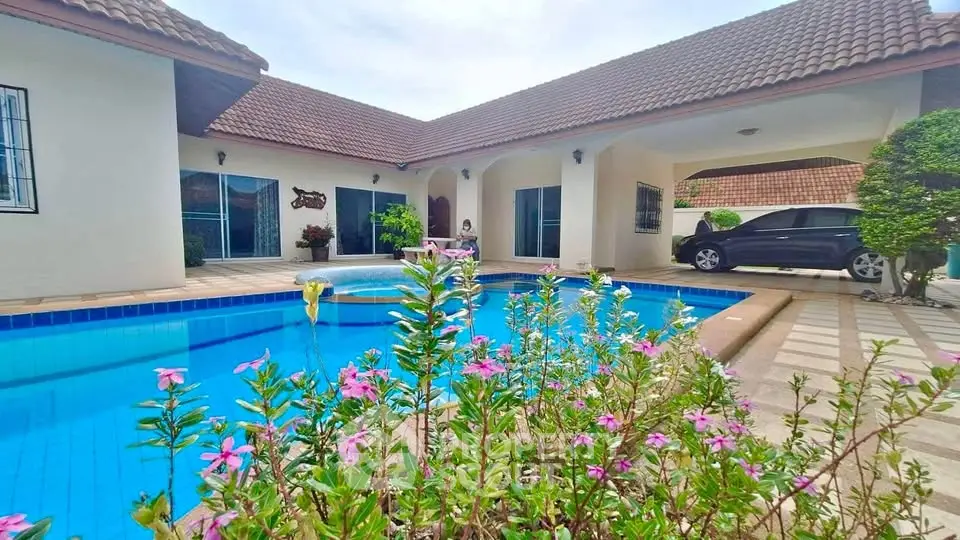 Charming villa with private pool and lush garden, perfect for luxury living.