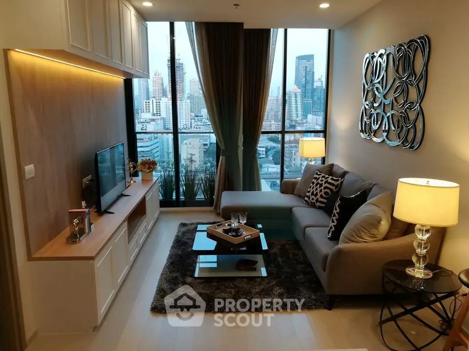 Stylish modern living room with city view, elegant decor, and cozy ambiance.