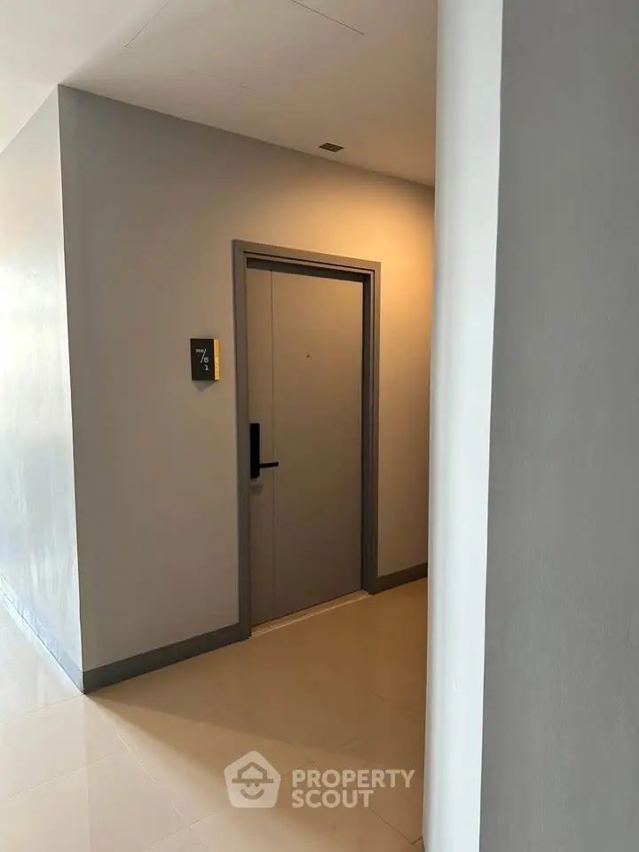 Modern apartment building elevator entrance with sleek design