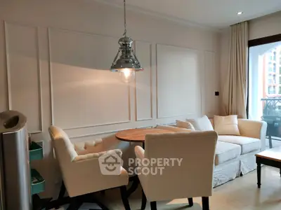 Elegant living room with cozy seating and stylish lighting