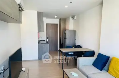 Modern living room with open kitchen in stylish apartment