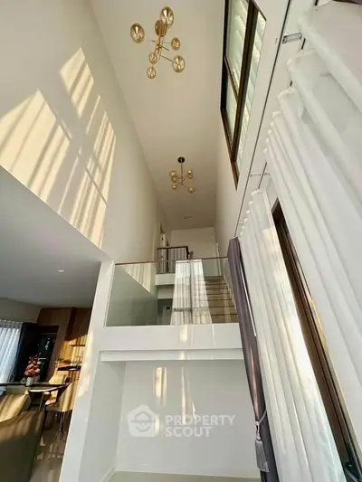 Stunning modern duplex with high ceilings and elegant lighting fixtures