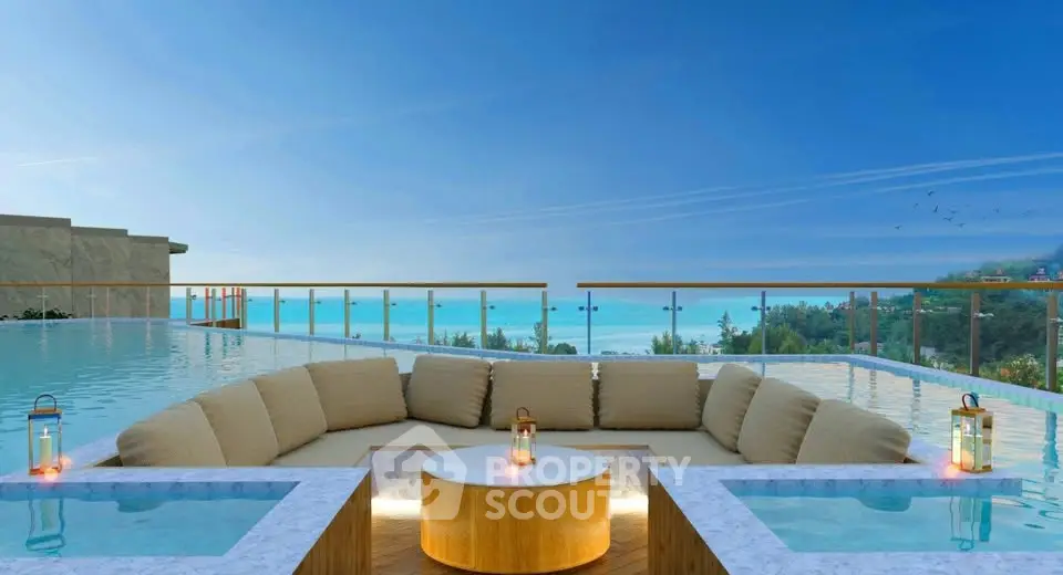 Luxurious rooftop pool with stunning ocean view and elegant seating area.