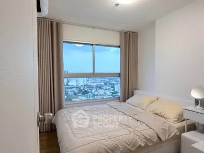 Cozy bedroom with city view, featuring a comfortable bed and soft lighting, perfect for relaxation.