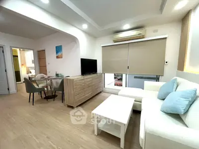 Modern living room with sleek furniture and natural light