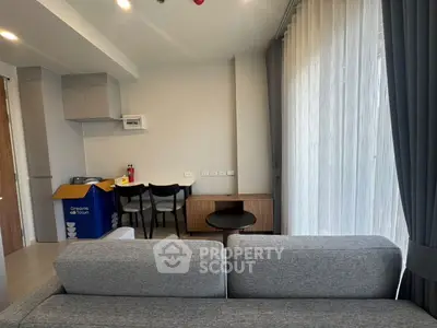 Modern living room with sleek furniture and natural light