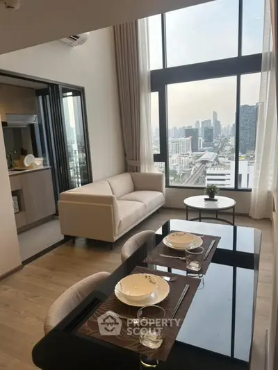 Modern living room with city view, high ceilings, and elegant dining area in luxury apartment.