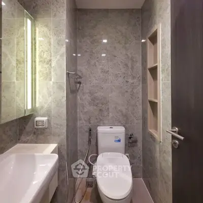 Modern bathroom with sleek design and marble tiles