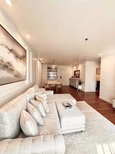 Elegant living room with modern decor and cozy seating area