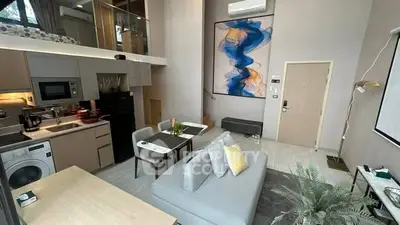 Modern loft apartment with open kitchen and stylish living area