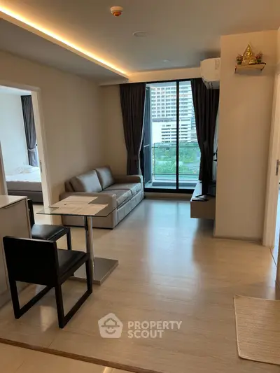 Modern living room with balcony view in stylish apartment