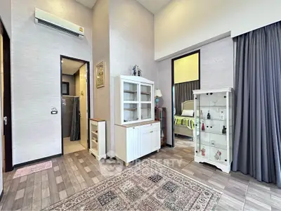 Elegant living space with stylish cabinets and modern decor