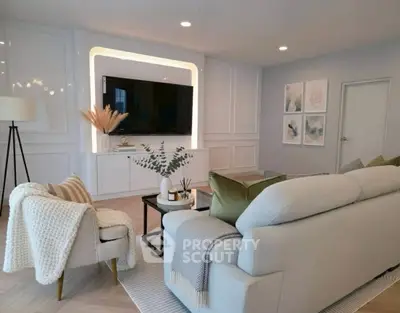 Elegant living room with modern decor and cozy seating area