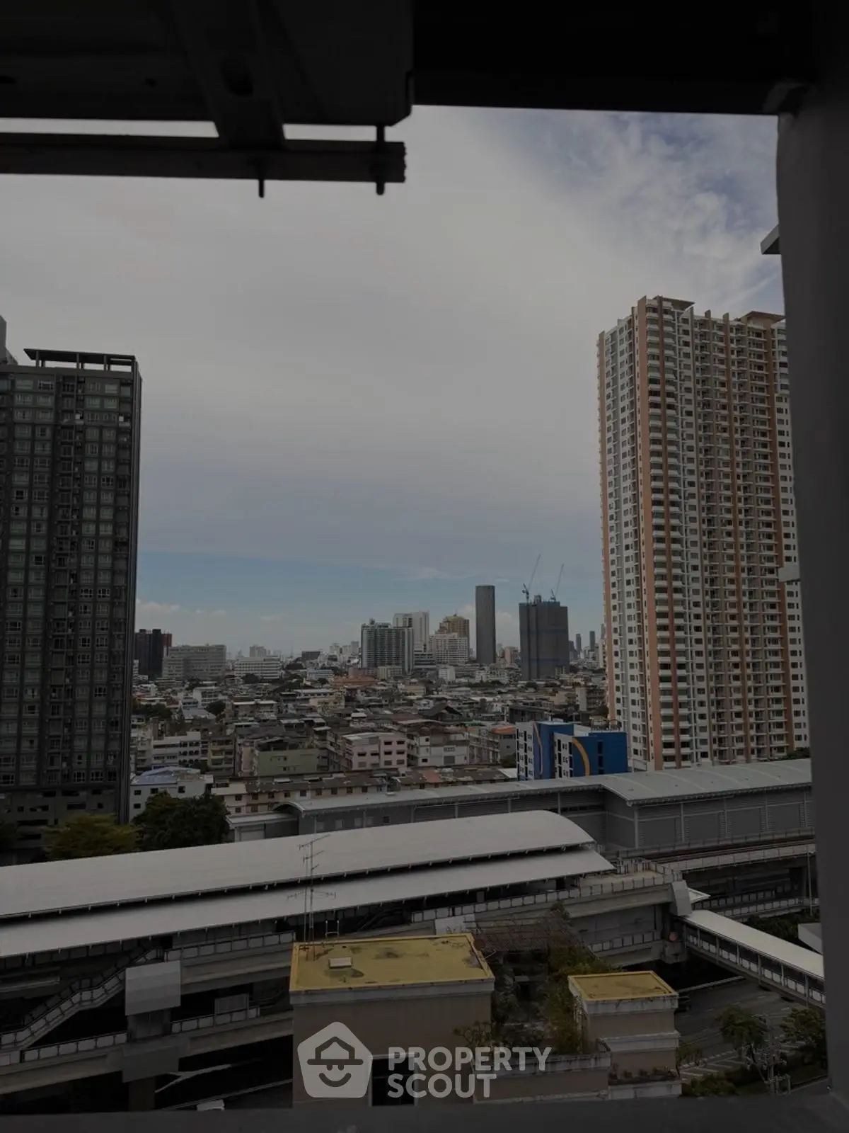 Stunning urban cityscape view from high-rise building balcony