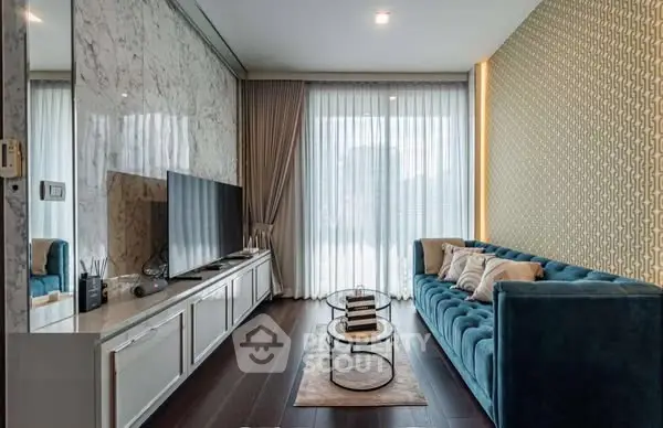 Stylish modern living room with elegant decor and large TV