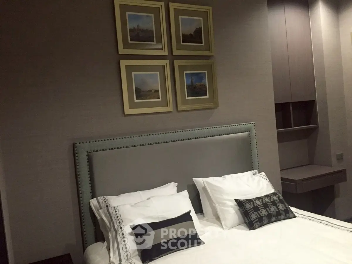 Luxurious bedroom with elegant decor and stylish wall art